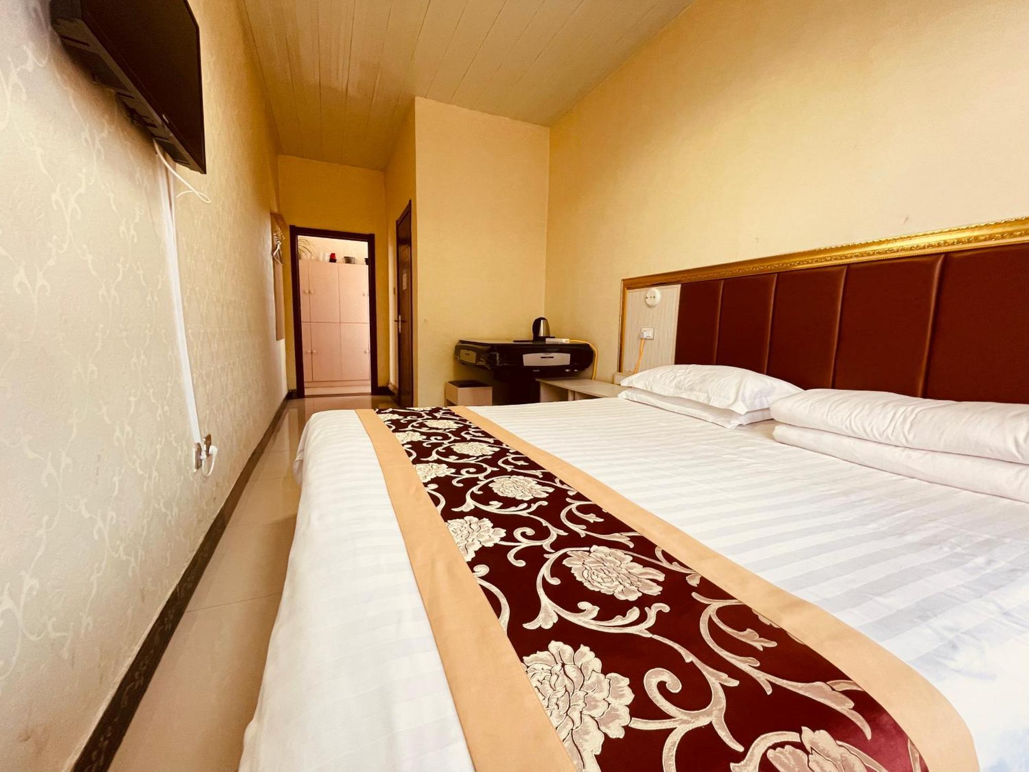哈尔滨机场东方红运宾馆 Otel Oda fotoğraf